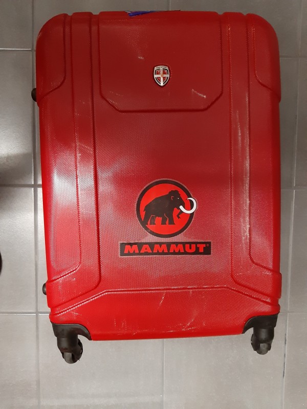 Valise à roulettes - rigide